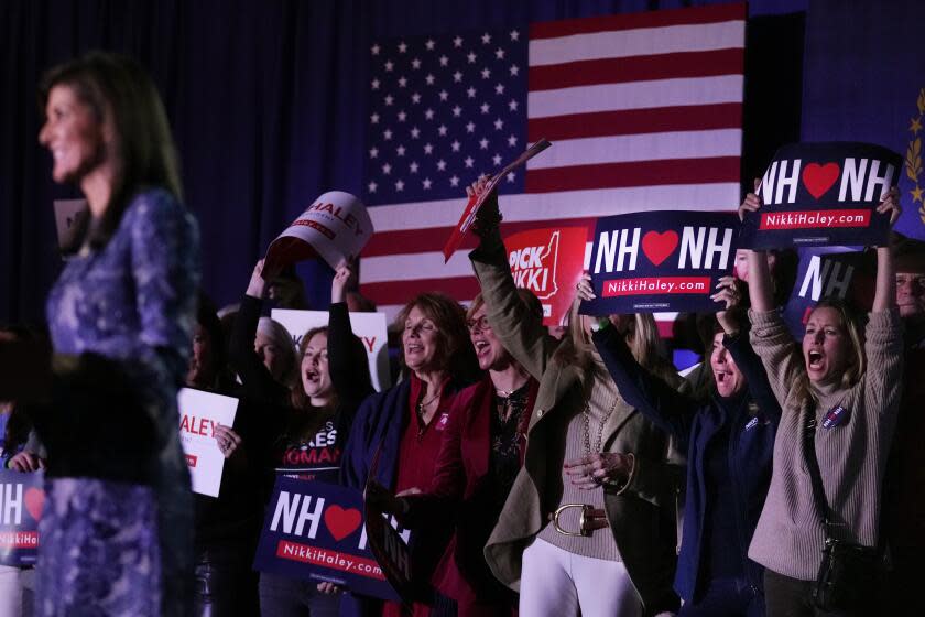 Supporters cheer as Republican presidential candidate former UN Ambassador Nikki Haley addresses a gathering during a New Hampshire Primary night rally, in Concord, N.H., Tuesday Jan. 23, 2024. (AP Photo/Charles Krupa)
