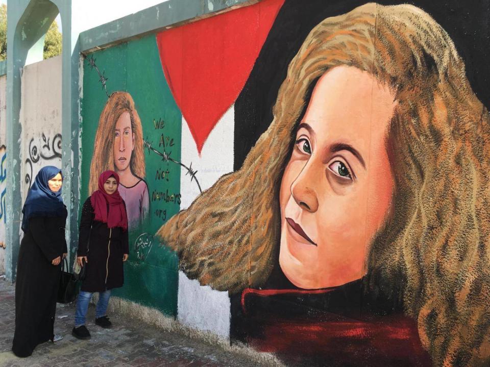 A mural by artist Rafiq al Sharif in Gaza of Palestinian teenager, Ahed Tamimi, who was jailed for slapping a soldier in the West Bank (Sarah Helm)