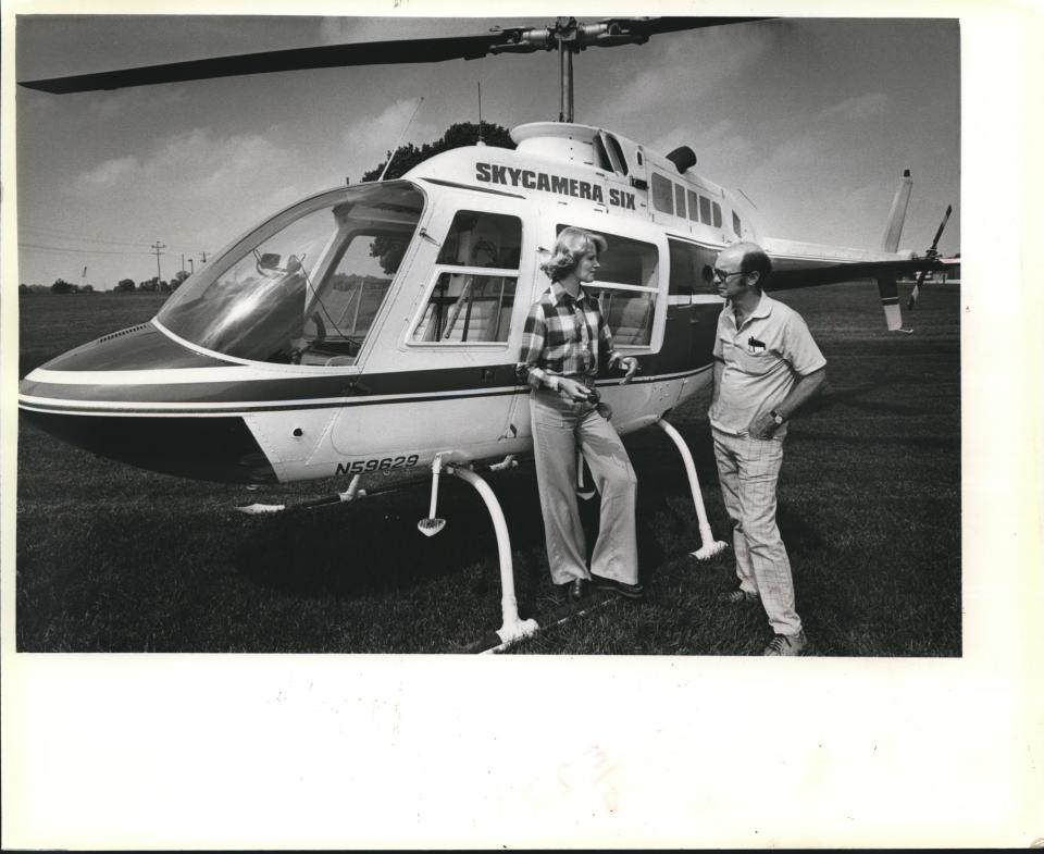 WITI-TV (Channel 6) News Director Jill Geisler, left, is joined by Milwaukee Journal TV/radio critic Mike Drew for a ride in Skycamera Six, the TV station's then-new helicopter, in this 1979 photo.