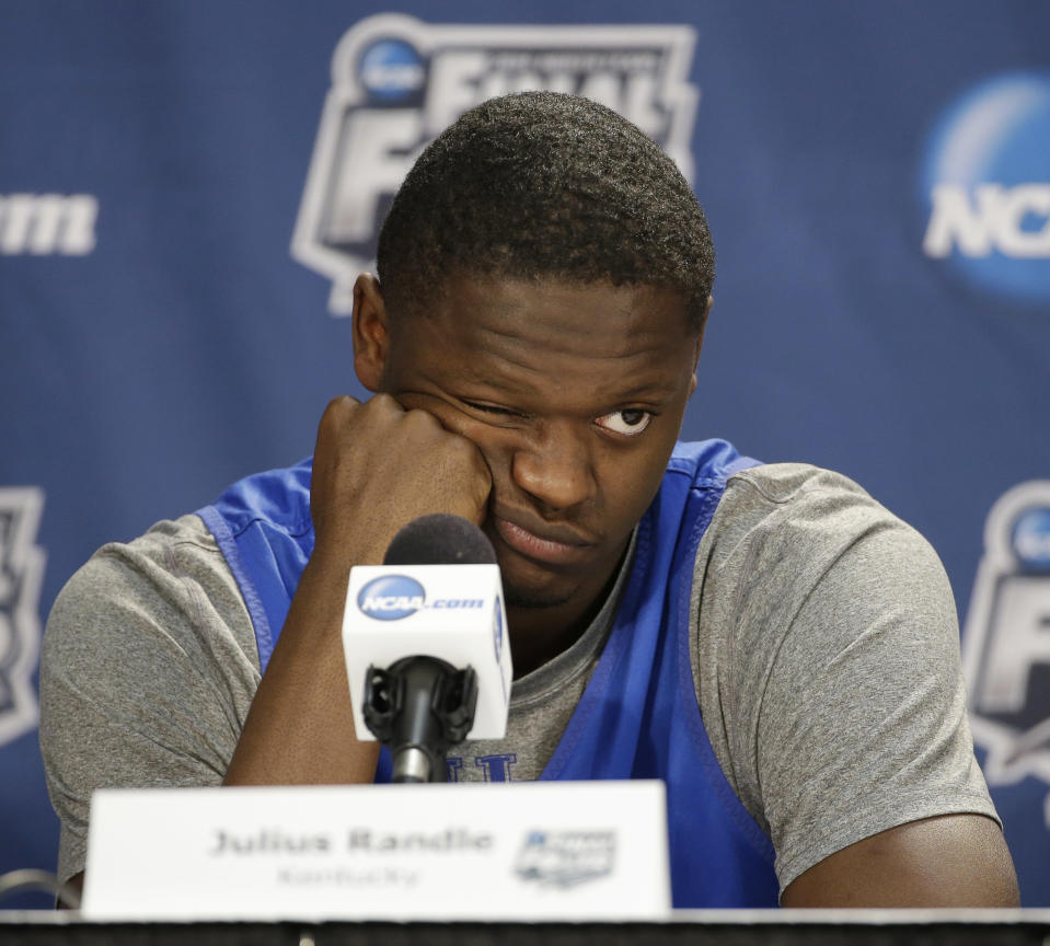 Kentucky forward Julius Randle answers a question during a news conference for the NCAA Final Four tournament college basketball championship game Sunday, April 6, 2014, in Arlington, Texas. Kentucky plays Connecticut in the championship game on Monday, April 7. 2014. (AP Photo/Tony Gutierrez)