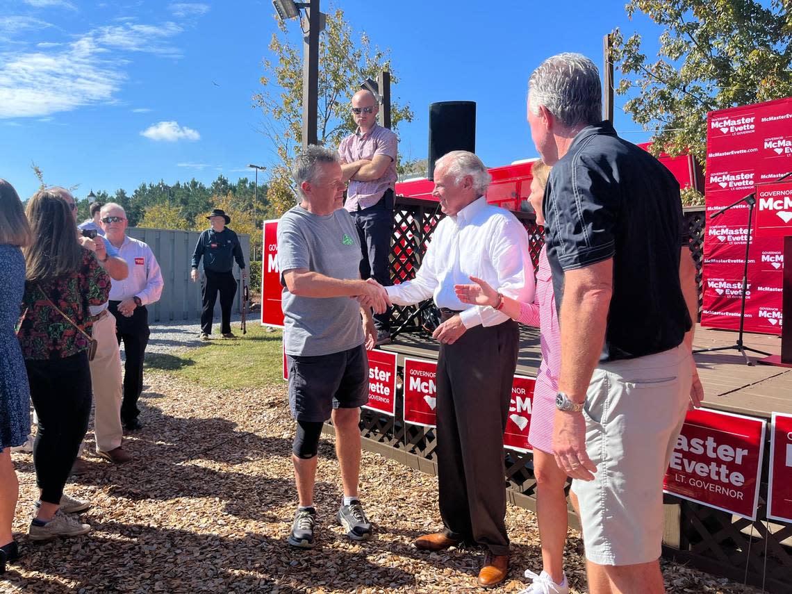 Gov. Henry McMaster shakes hands with supporters at a rally at the Okatie Ale House in Bluffton Wednesday ahead of the midterms.