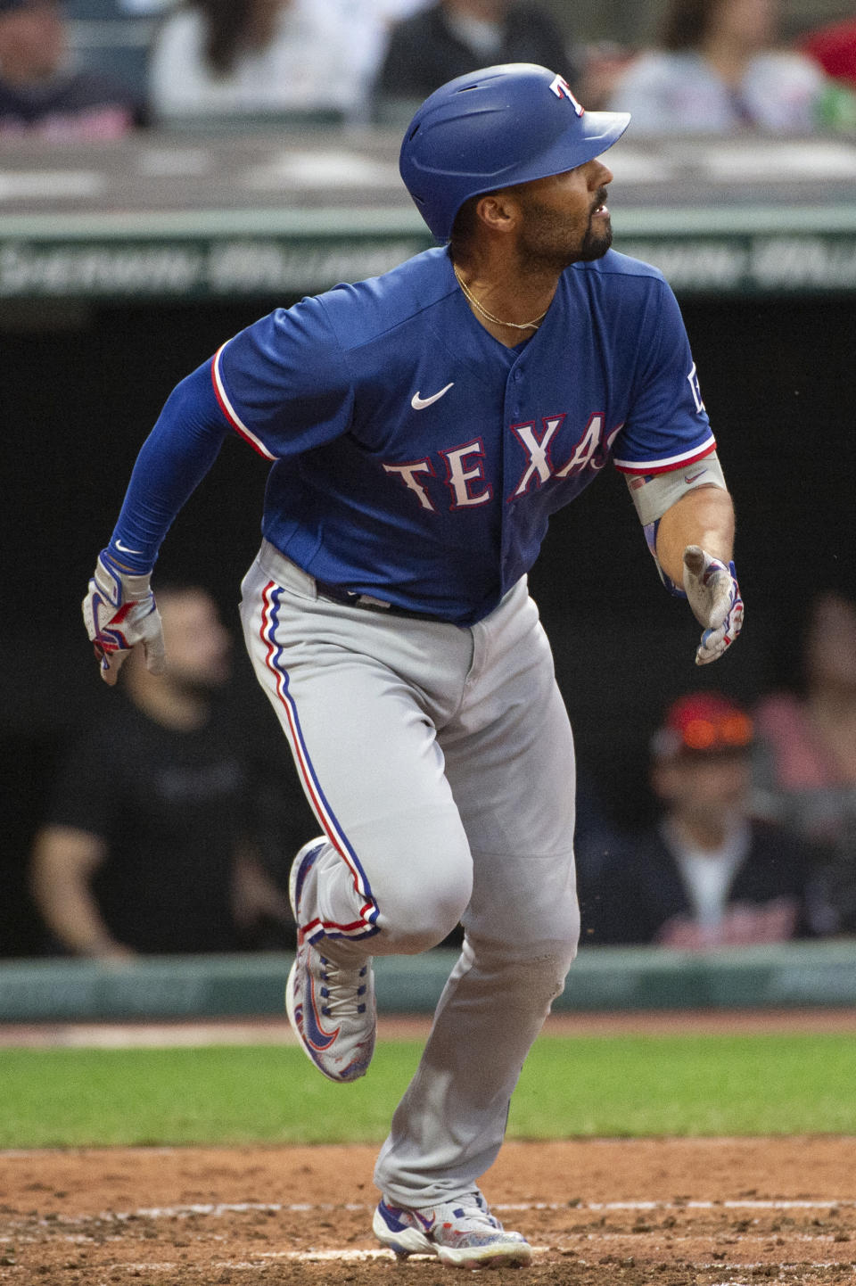 Texas Rangers' Marcus Semien watches his RBI double off Cleveland Guardians starting pitcher Tanner Bibee during the fifth inning of a baseball game in Cleveland, Saturday, Sept. 16, 2023. (AP Photo/Phil Long)