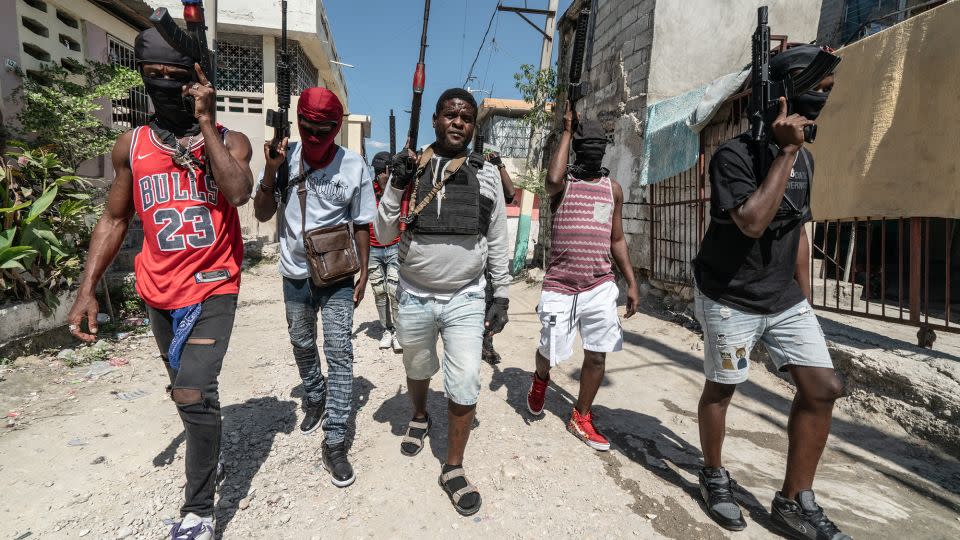 Gang Leader Jimmy 'Barbecue' Cherizier patrols the streets with G-9 federation gang members in the Delmas 3 area on February 22, 2024, in Port-au-Prince, Haiti. There has a been fresh wave of violence in Port-au-Prince where, according to UN estimates, gangs control 80% of the city. - Giles Clarke/Getty Images