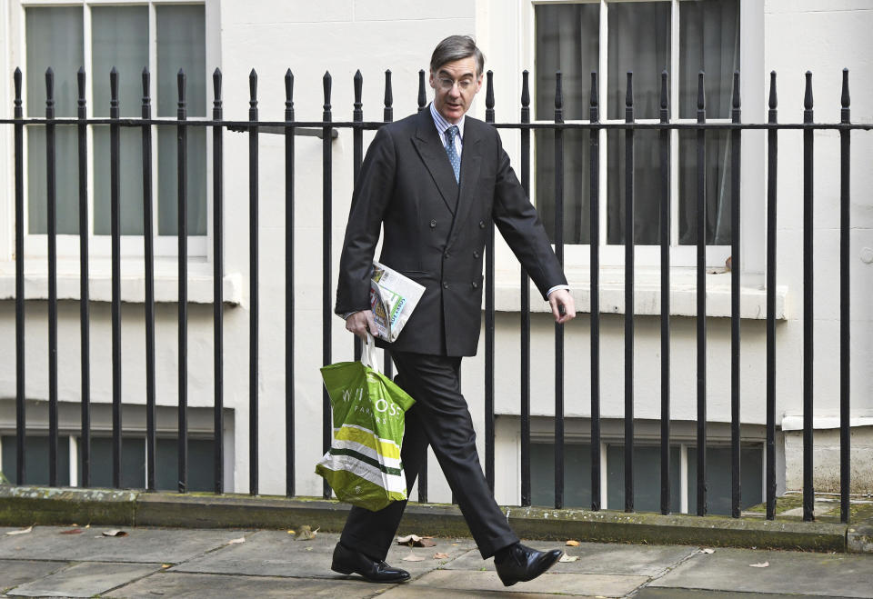 Leader of the House of Commons Jacob Rees-Mogg arrives for a Cabinet meeting at 10 Downing Street in London, Tuesday Oct. 8, 2019. Britain and the European Union appeared to be poles apart Monday on a potential Brexit deal. (Stefan Rousseau/PA via AP)