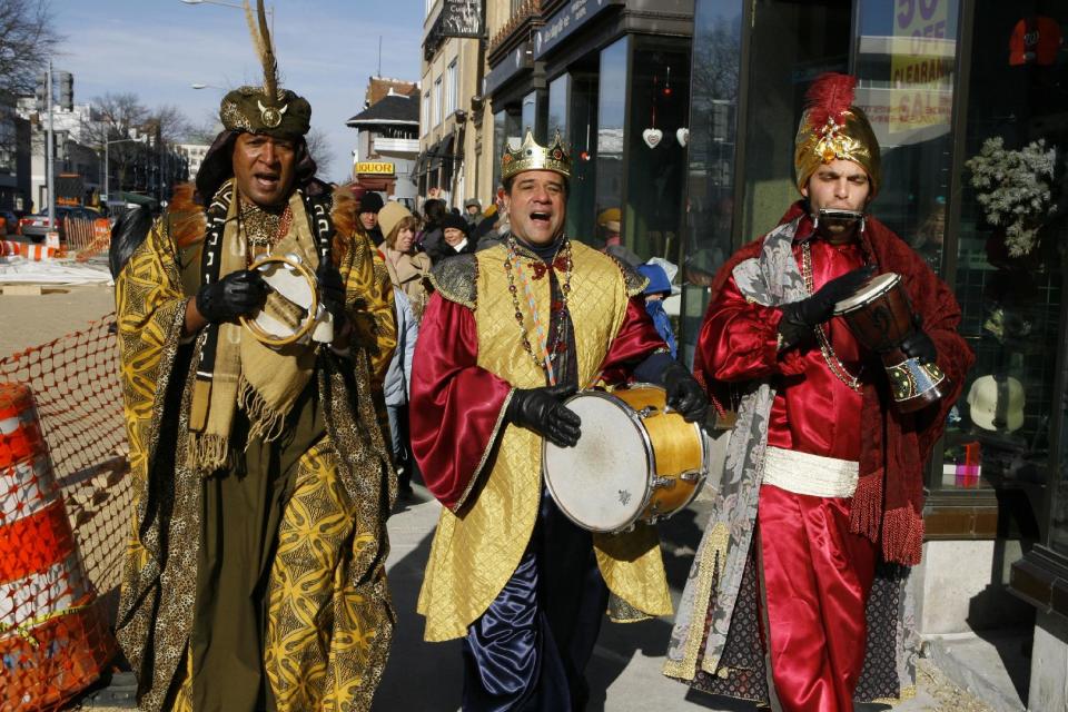 FILE - In this Jan. 3, 2010 file photo, The Three Kings, from left Osvaldo Cameron, Hector Diaz and Mattias Kraemer lead a procession around The Gala Hispanic Theater in the Columbia Heights neighborhood of Washington. Three Kings Day, or Epiphany is celebrated in many parts of the world marking the day on the Christian calendar when the magi brought gifts to the baby Jesus. Many Hispanic communities in the U.S. celebrate Three Kings Day with parades and performances, and in January, 2013, Disneyland in Anaheim, Calif., is expanding a celebration of the holiday that it first launched in 2012. (AP Photo/Jose Luis Magana, File)