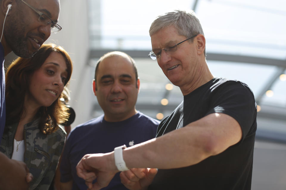 Tim Cook showing off his Apple Watch 