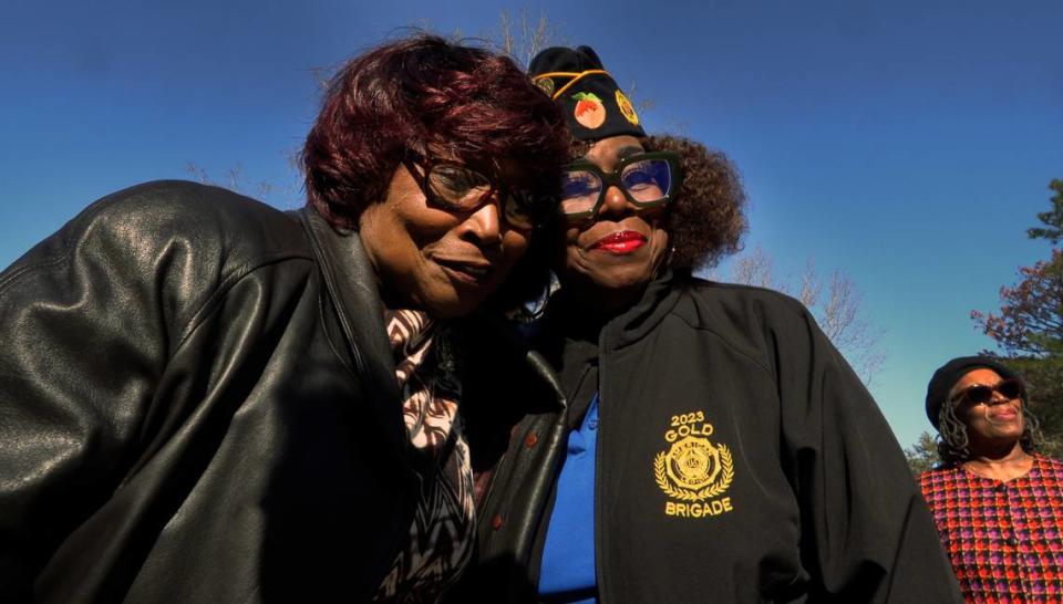 Betty Jean Harvey-Glance, left, the sister of Tommy Lee Harvey Jr., hugs Patricia Liddell, with American Legion Post 333 in Columbus, Georgia., after a Thursday afternoon funeral at Fort Mitchell National Cemetery for Harvey. 01/04/2024