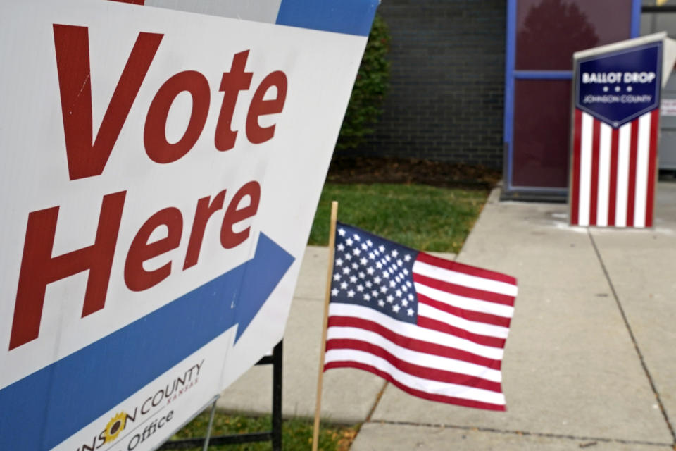 FILE - In this Oct. 20, 2020 file photo, a voting location is shown in Mission, Kan. A new survey by The Associated Press-NORC Center for Public Opinion Research and USAFacts finds that while voters say it’s pretty easy to find accurate information about voting, they have a harder time knowing whether there's any factual basis for the information they're getting from and about the candidates. (AP Photo/Charlie Riedel)