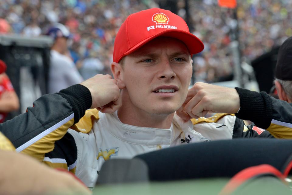 Team Penske driver Josef Newgarden (2) gets ready to get in his car Friday, May 27, 2022, on Carb Day ahead of the 106th running of the Indianapolis 500 at Indianapolis Motor Speedway