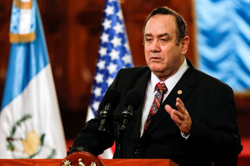 Guatemala's president, Alejandro Giammattei, speaks during February 2020 news conference in Guatemala City