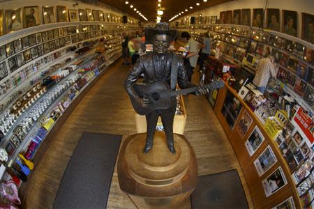 Patrons visit Ernest Tubb Record Shop in downtown Nashville, Tennessee June 19, 2013. REUTERS/Harrison McClary