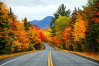 <p>A scenic view of a road running through the White Mountains of New Hampshire.</p>