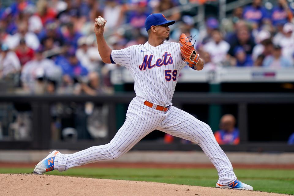 New York Mets starting pitcher Carlos Carrasco (59) throws in the second inning of a baseball game against the Washington Nationals, Wednesday, June 1, 2022, in New York. (AP Photo/John Minchillo)