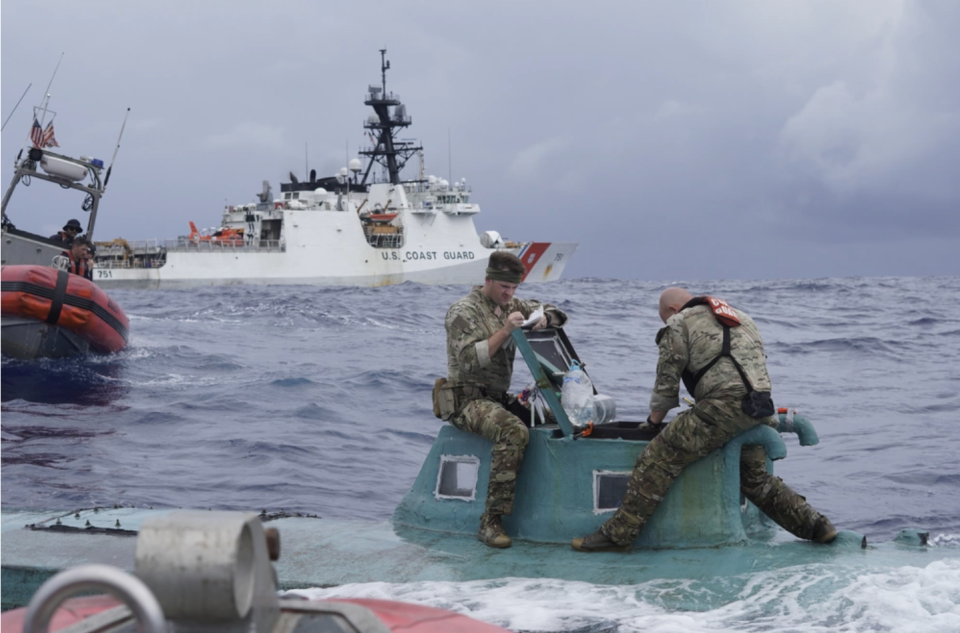 Members of the Coast Guard Cutter Waesche law enforcement boarding team are pictured inspecting a self-propelled semi-submersible (SPSS) in international waters of the Eastern Pacific Ocean in November.