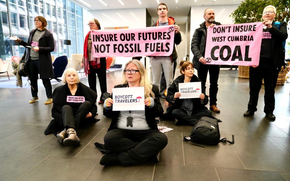 The activists dressed in business attire as they entered major office buildings