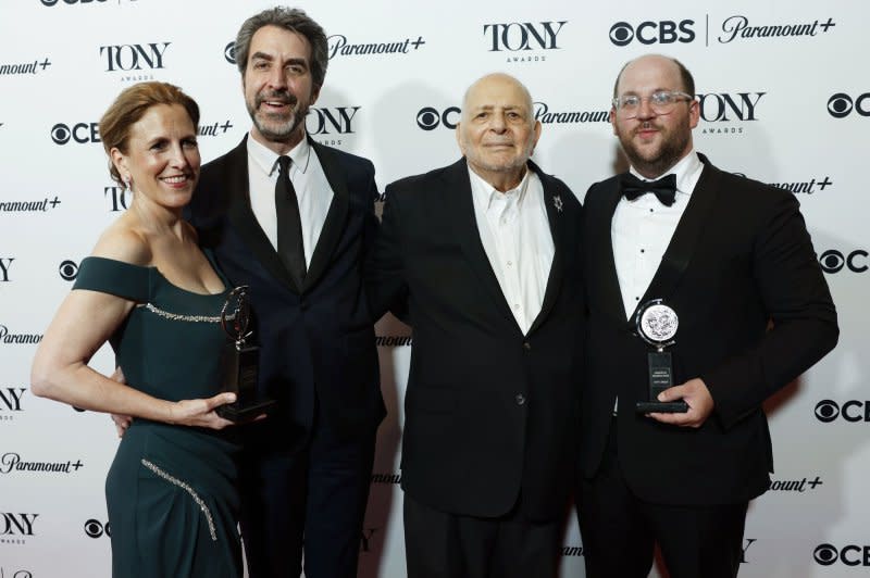 Left to right, Kristin Caskey, Jason Robert Brown, Alfred Uhry, Greg Nobile, winners of the award for Best Revival of a Musical for "Parade," hold a Tony Award at the 76th Annual Tony Awards on June 11, 2023 in New York City. File Photo by John Angelillo/UPI