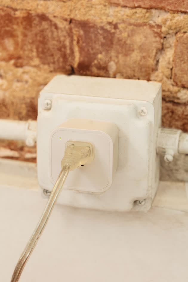 Cord plugged into smart plug on brick wall (Photo: Cox Communications)
