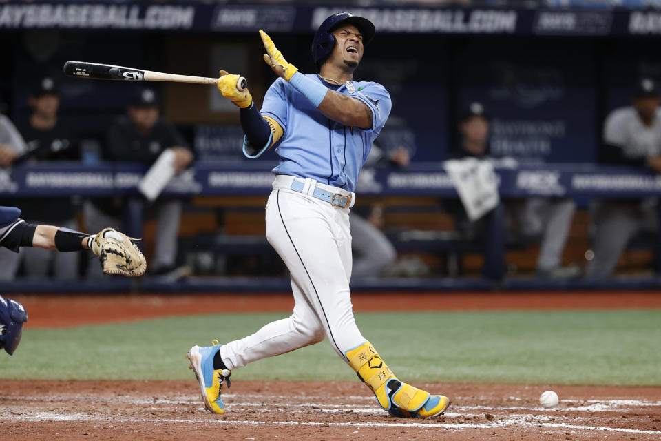 Tampa Bay Rays' Wander Franco reacts after fouling the ball off himself during the seventh inning against the New York Yankees in a baseball game Friday, May 27, 2022, in St. Petersburg, Fla. (AP Photo/Scott Audette)