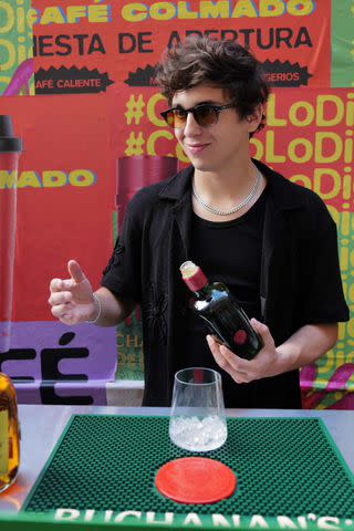 <p>José "Tutes" Tutivén</p> Marcello Hernandez serves up cocktails with Buchanan's Whisky at the grand opening of Café Colmado in NYC