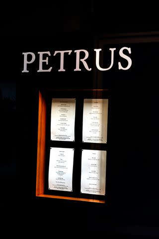 <p>Dave Rushen/SOPA Images/LightRocket via Getty </p> Exterior of Pétrus by Gordon Ramsay showing the menus of the day.