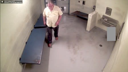 Guy Leonard paces in his cell at the Chatham County Detention Center in Savannah