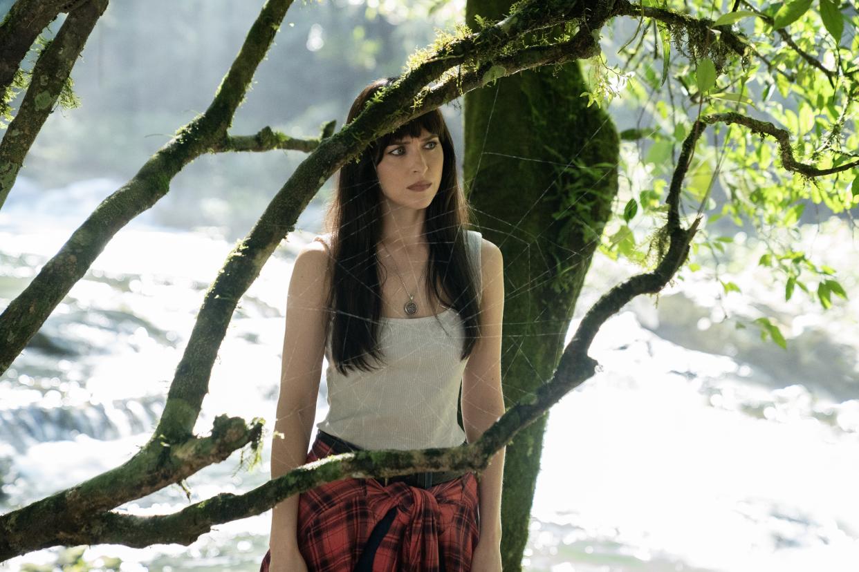 Dakota Johnson in the Amazon rainforest in a scene from Madame Web