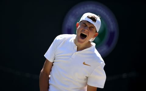 Jack Draper reacts in Boys' singles final on day thirteen of the Wimbledon Championships at the All England Lawn Tennis and Croquet Club, Wimbledon - Credit: PA