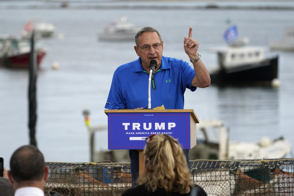 FILE -Former Maine Gov. Paul LePage campaigns for President Donald Trump in Saco, Maine, in this Sept. 17, 2020 file photo. LePage, who moved to Florida after his second term, has returned to Maine to challenge Democratic Gov. Janet Mills. (AP Photo/Robert F. Bukaty)