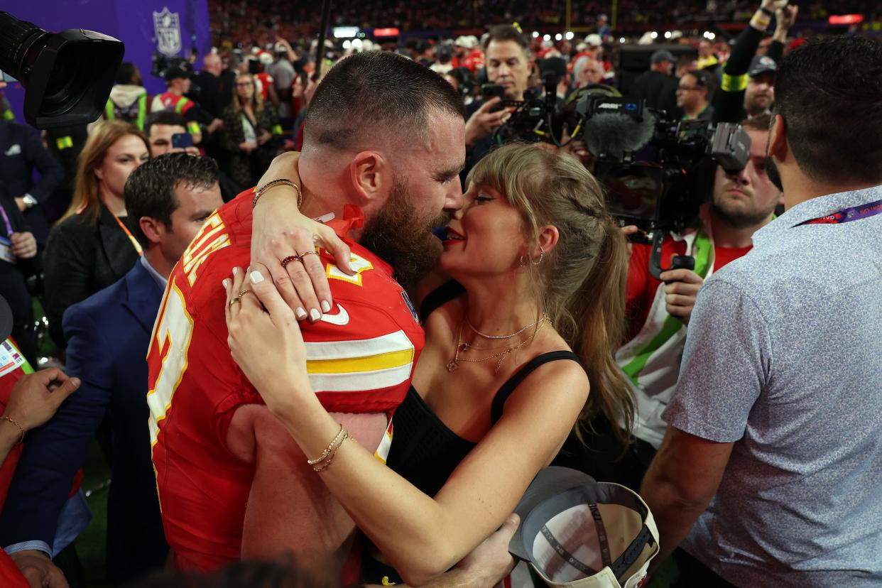 Travis Kelce #87 of the Kansas City Chiefs and Taylor Swift embrace after defeating the San Francisco 49ers in overtime during Super Bowl LVIII at Allegiant Stadium on Feb. 11, 2024, in Las Vegas,