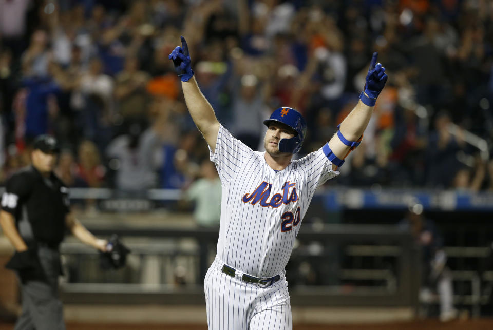 NEW YORK, NEW YORK - SEPTEMBER 28:   Pete Alonso #20 of the New York Mets celebrates his third inning home run against the Atlanta Braves at Citi Field on September 28, 2019 in New York City. The Mets defeated the Braves 3-0.  The home run was Alonso's 53rd of the season setting a new rookie record.  (Photo by Jim McIsaac/Getty Images)