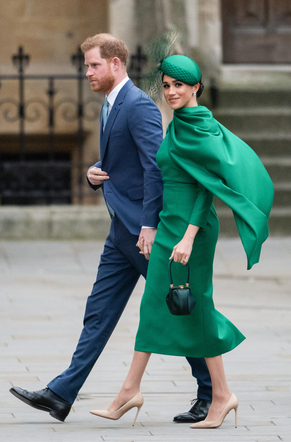 Wearing an Emilia Wickstead dress and Gabriella Hearst bag. (Getty Images)