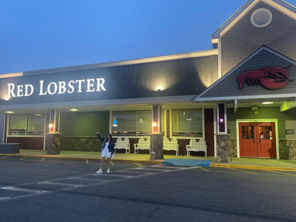 The writer poses outside Red Lobster