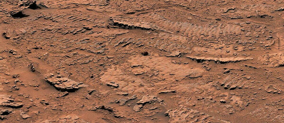 Il y a plusieurs milliards d'années sur la planète rouge, des vagues à la surface d'un lac peu profond ont agité des sédiments et créé ces textures ondulées repérées par le rover Curiosity sur les pentes du Mont Sharp.   - Credit:NASA/JPL-Caltech/MSSS