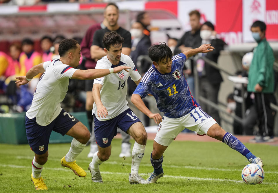 United States Sergino Dest, United States Luca de la Torre and Japan's Takefusa Kubo challenge during the international friendly soccer match between USA and Japan as part of the Kirin Challenge Cup in Duesseldorf, Germany, Friday, Sept. 23, 2022. (AP Photo/Martin Meissner)