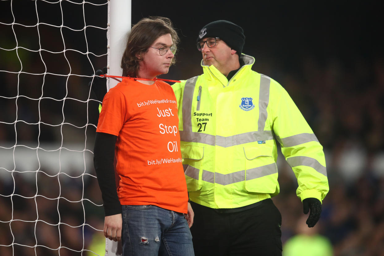 This pitch invader during Thursday's Everton-Newcastle match had an endgame, unlike most of them. (Photo by Chris Brunskill/Fantasista/Getty Images)