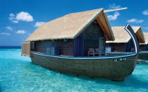 <p>One of our favorite resorts for <a rel="nofollow noopener" href="http://www.travelandleisure.com/trip-ideas/spa-vacations/maldives-best-spa-destination" target="_blank" data-ylk="slk:spa experiences in the Maldives;elm:context_link;itc:0;sec:content-canvas" class="link ">spa experiences in the Maldives</a>, the COMO Cocoa Island Resort, has 33 upscale overwater bungalows. Book one of eight split-level Dhoni Suites, which seem to float, boat-like, over the lagoon. Take advantage of <a rel="nofollow noopener" href="http://www.comohotels.com/cocoaisland/" target="_blank" data-ylk="slk:the resort's;elm:context_link;itc:0;sec:content-canvas" class="link ">the resort's</a> complimentary sunrise and sunset yoga classes, as well as inclusive aquatic therapy sessions. </p>