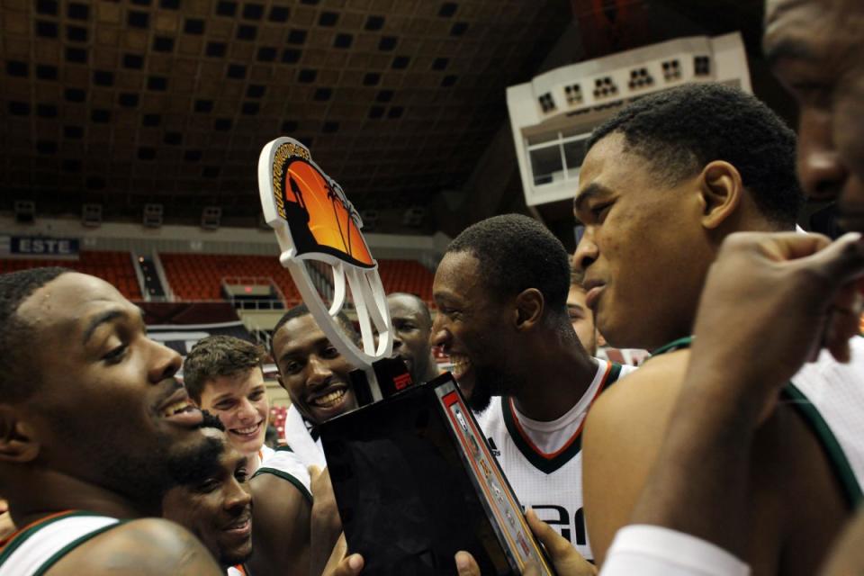 Miami celebrates after capturing last year's Puerto Rico Tip-Off (AP)