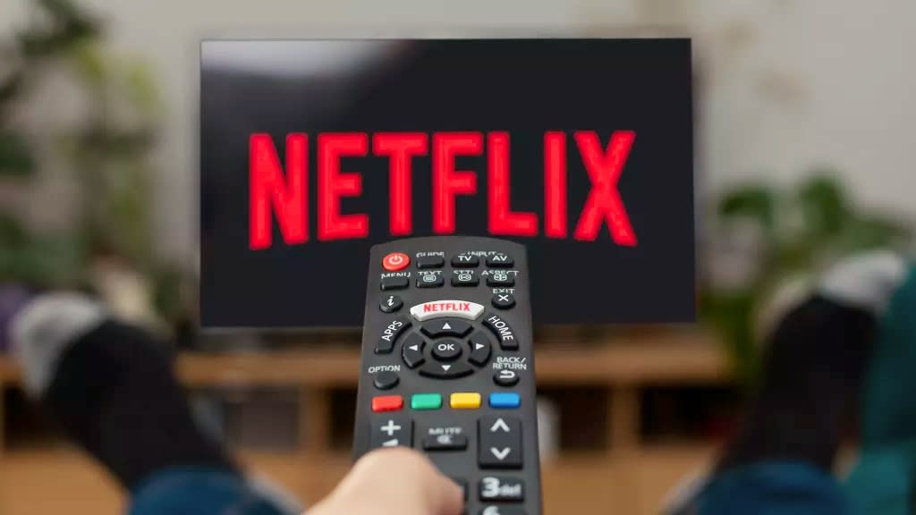  Netflix on TV with remote control in foreground 