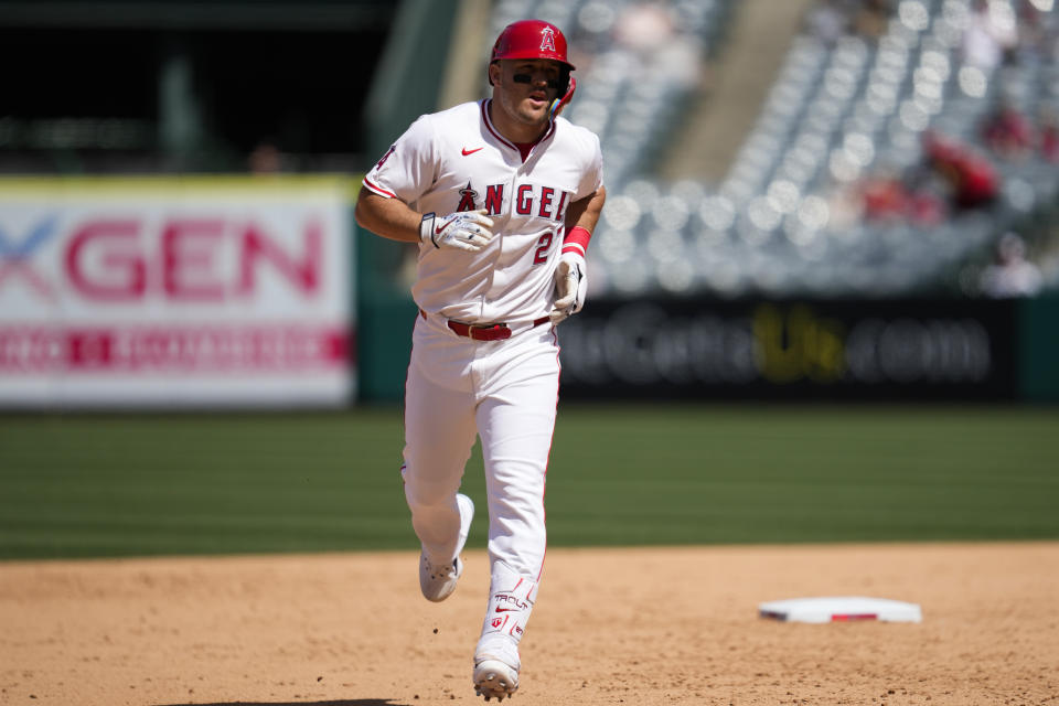 Los Angeles Angels designated hitter Mike Trout runs the bases after hitting a home run during the sixth inning of a baseball game against the Baltimore Orioles in Anaheim, Calif., Wednesday, April 24, 2024. (AP Photo/Ashley Landis)
