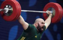 Weightlifting: Damon Kelly is not considered a real chance of a medal but after taking gold at the Samoan Olympic qualifiers and joining the world's top 20 the super heavyweight may surprise everyone.