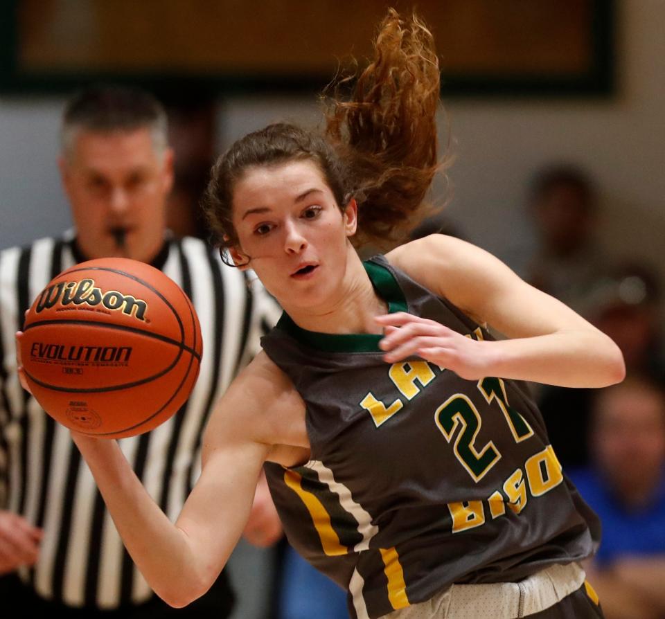 Benton Central Bison guard Rachel Tolen (21) catches a pass during the IHSAA girl’s basketball sectional game against the Rensselaer Bombers, Friday, Feb. 3, 2023, at the Benton Central in Oxford, Ind. Benton Central won 54-51.