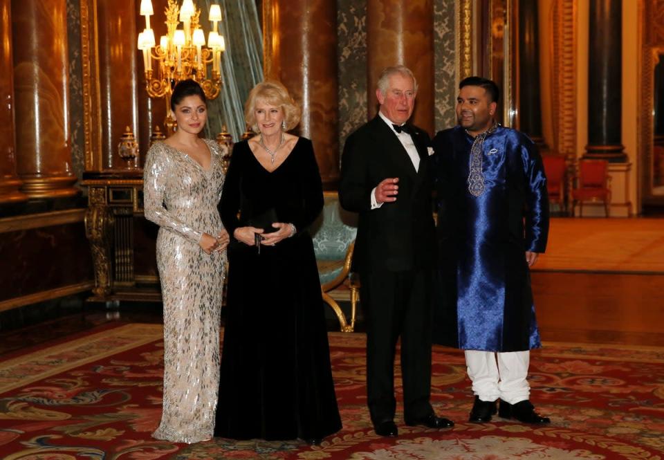 The then Prince of Wales and the Duchess of Cornwall with music producer Naughty Boy and Kanika Kapoor at Buckingham Palace (Alastair Grant / PA) (PA Archive)