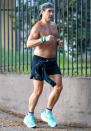 <p>Colin Farrell breaks a sweat while running in Los Angeles on July 5. </p>