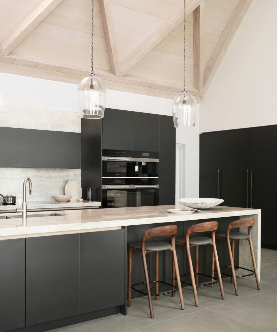 Kitchen island, chairs, black cabinets