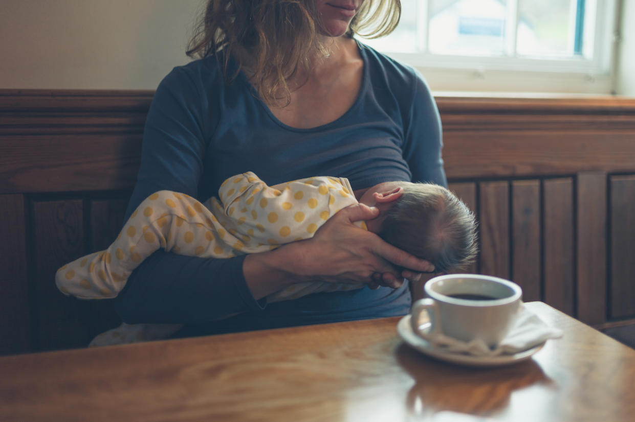 A mum has opened up about being shamed for breastfeeding her baby in a cafe [Photo: posed by model Getty]