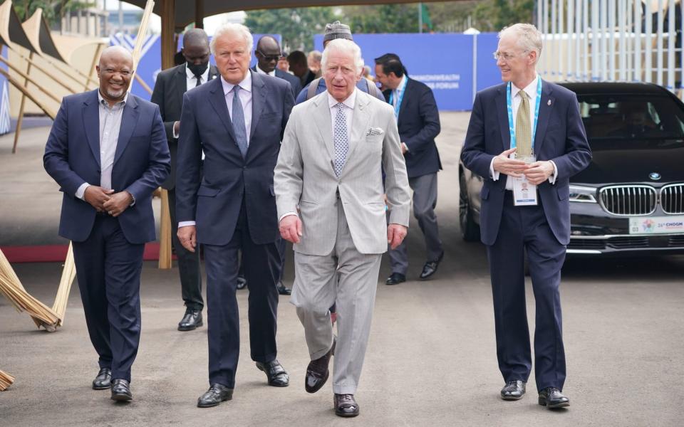 The Prince of Wales (centre) arrives to attend a Commonwealth Business Forum Exhibition at Kigali Cultural Exhibition Village, as part of his visit to Rwanda - Jonathan Brady/PA