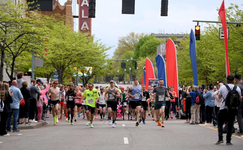 Runners start the marathon, half marathon, 10K and team relay races at Sunday's 10th Canton Hall of Fame Marathon.