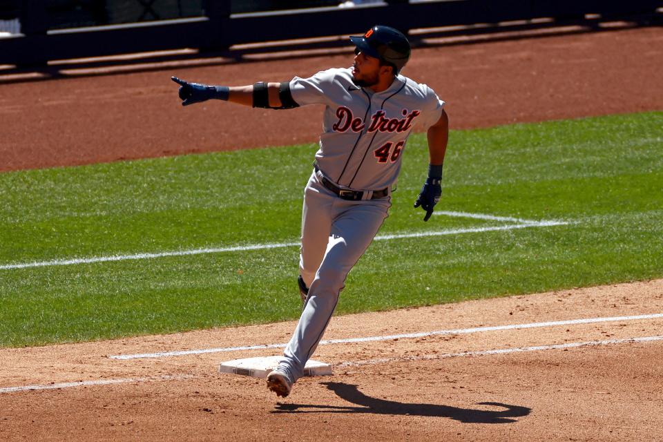 Tigers third baseman Jeimer Candelario reacts as he rounds first base after hitting a solo home run against the Yankees during the fourth inning of the Tigers' 6-4 loss on Saturday, May 1, 2021, in New York.