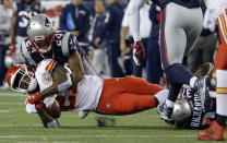 <p>New England Patriots defensive backs Stephon Gilmore (24) and Jordan Richards (37) tackle Kansas City Chiefs running back Kareem Hunt (27) during the first half of an NFL football game, Thursday, Sept. 7, 2017, in Foxborough, Mass. (AP Photo/Steven Senne) </p>