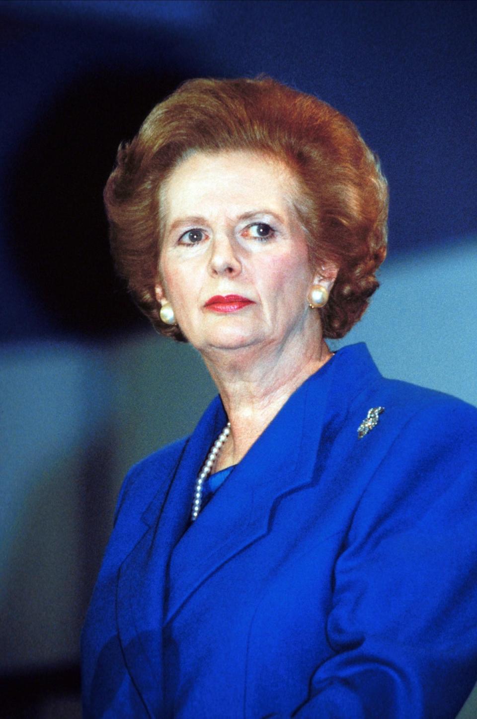 Margaret Thatcher is well-known for her stoic, blue power dressing (Alamy/PA)